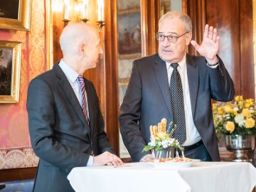 Bundesminister-Kocher und der Schweizer Bundesrat-Guy-Parmelin